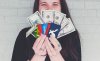 girl-holding-cash-and-gift-cards.jpg