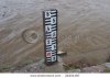stock-photo-black-and-white-water-gauge-in-perspective-24201187.jpg
