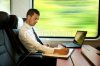 10333205-10333205-young-businessman-working-on-train.jpg
